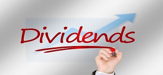 dividend text with rising stock chart