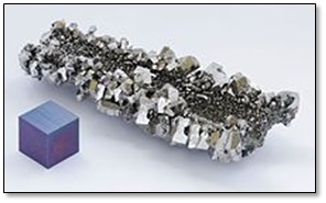 Niobium Ore and Cube of Oxidized Niobium